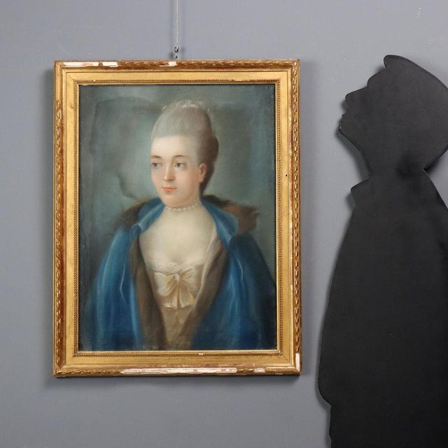 Crayons on paper mounted on canvas. Portrait in walking dress, with her cloak draped over her shoulders, of Queen Marie...