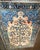 An exceptional antique Persian Mohajeran Sarouk dating to approximately 1910, masterfully woven with a magnificent Tree of...