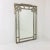 Faux silver leaf Greek key mirror. Mirror is in good vintage condition with wear due to age and use. Dimensions: 29" wide...