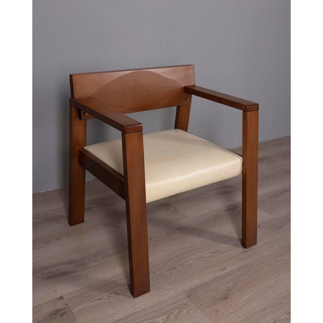 Armchair with lacquered walnut frame and white leather seat, Italian design, 1980s.