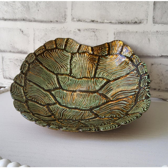 ​Enhance your space with this gorgeous Vietri Tortoise Shell Art Glass Bowl. It features an organic sea turtle shell...
