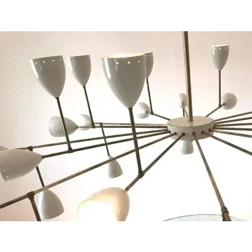 For a large room, a hall or an urban loft. This midcentury style chandelier has 32 lights. Branching chandeliers has the...