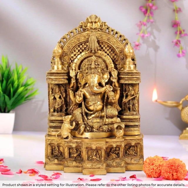 Invite the divine presence of Lord Ganesha into your home with this breathtaking 18 inch Ganesha statue. This Ornate...