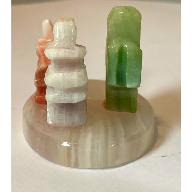 Cute thri colored onyx Figural art includes a donkey, cactus and man with sombrero.