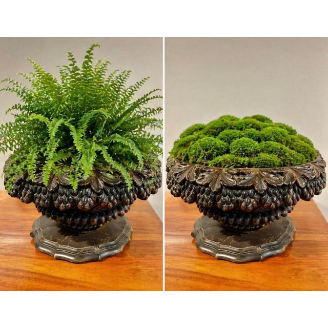 Wonderful ornate Swiss black forest hand carved wood planter with a fruit basket design. (For indoor use only). This...