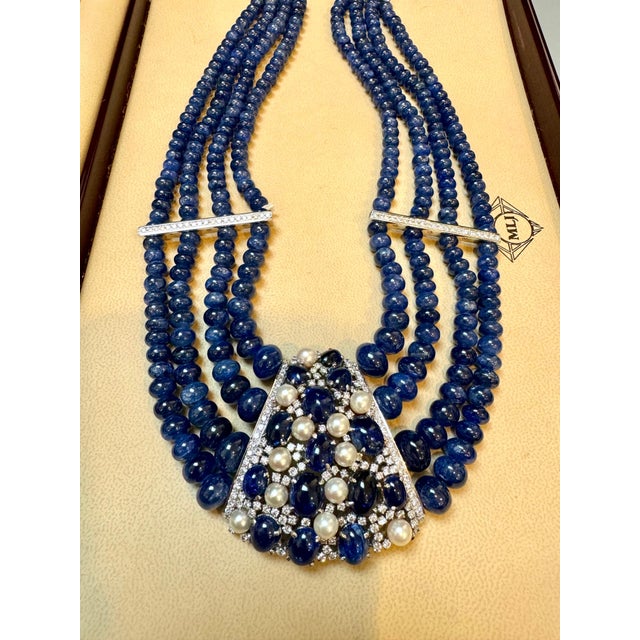 700 Ct Sapphire Bead Necklace with Sapphire cabochon & Diamond Center & Diamond Spacer in 18Karat white gold This...