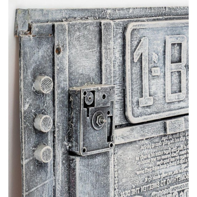 Bill Clark (American, XX-XXI), Found Object Assemblage on Board, 2000, overall painted grey with license plate, hood...