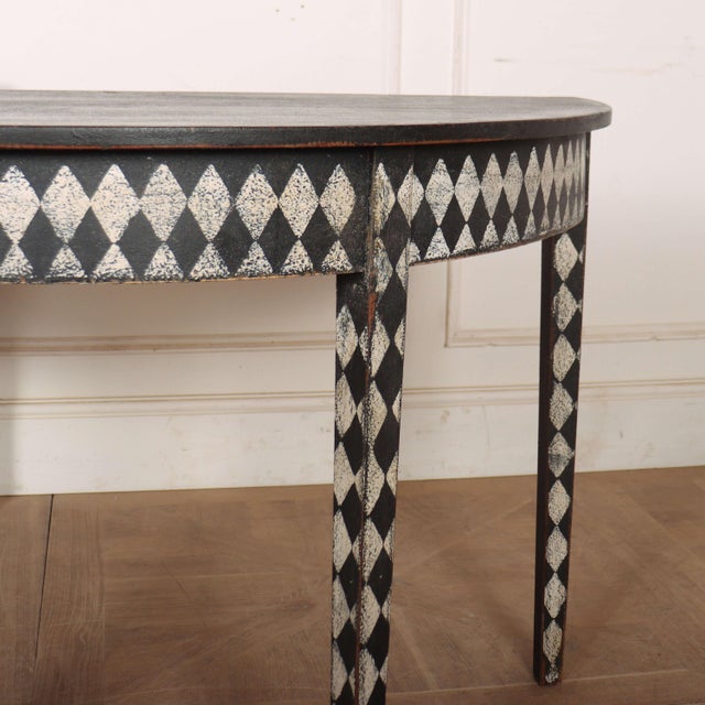 Interesting pair of 19th century English painted oak console tables. 1850. This piece is designed in the style of the...