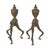 A pair of antique British fire dogs featuring a beautiful patina from age and use; high-quality brass construction, marked...