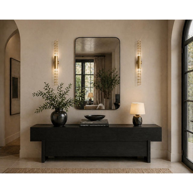 Striking pair of Palomar wall appliques designed by celebrated Italian designer Pietro Russo for Baxter, crafted in solid...
