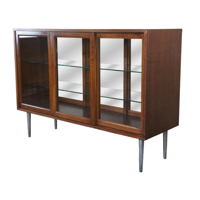 "This impressive showcase / room divider was a Custom order designed by Edward Wormley for Dunbar. Features a rectangular...