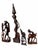 An expressive collection of four carved wooden sculptures featuring rich brown tones, dramatic dark grain, and intricate...