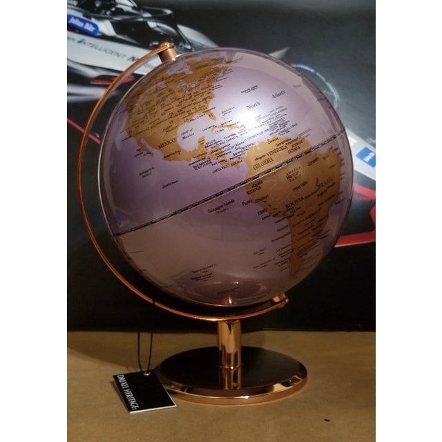 Add a touch of luxury and sophistication to your space with this stunning Drexel Heritage World Globe featuring a unique...
