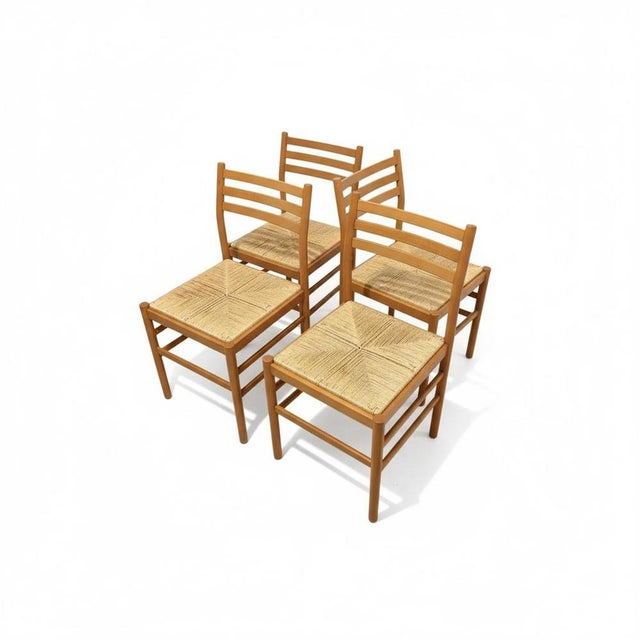 Italian beech dining chairs offer timeless style and lasting comfort for your kitchen or dining room. This set of four...