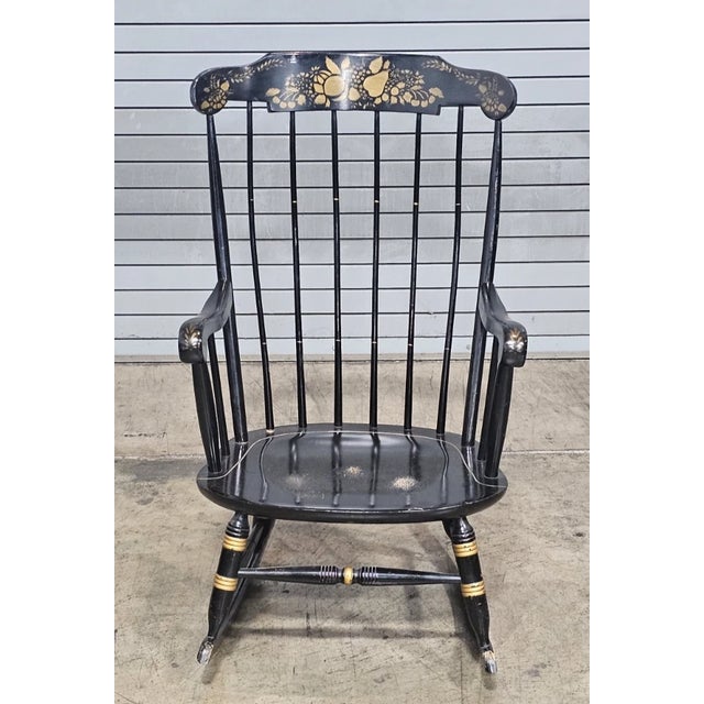 Store Item: Black Hitchcock Style Windsor Arm Rocking Chair Harvest Stencil Gold Accents Description: Chair has fan back...