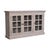 This cabinet showcases artisanal character through its labor-intensive caustic wash, creating a weathered, stone-like...