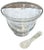 An elegant vintage glass caviar server accompanied by a petite mother-of-pearl spoon, combining beautifully simple form...