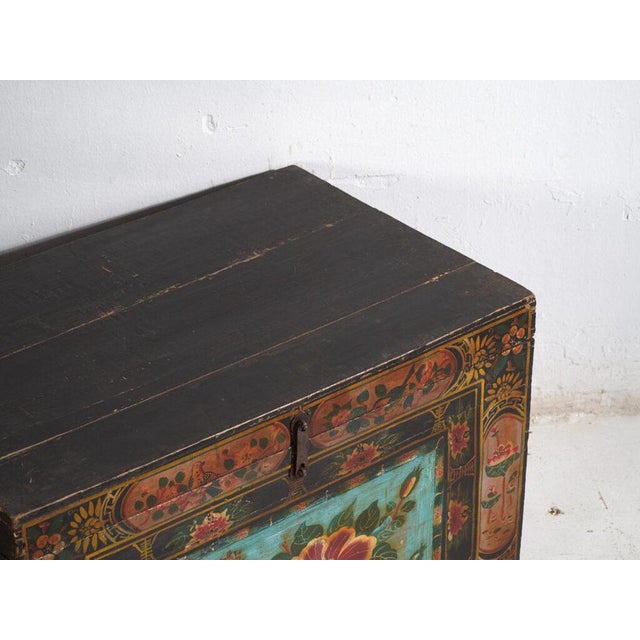 Antique painted Chinese trunk in pine wood, provincial painted furniture with polychrome composition originating from...