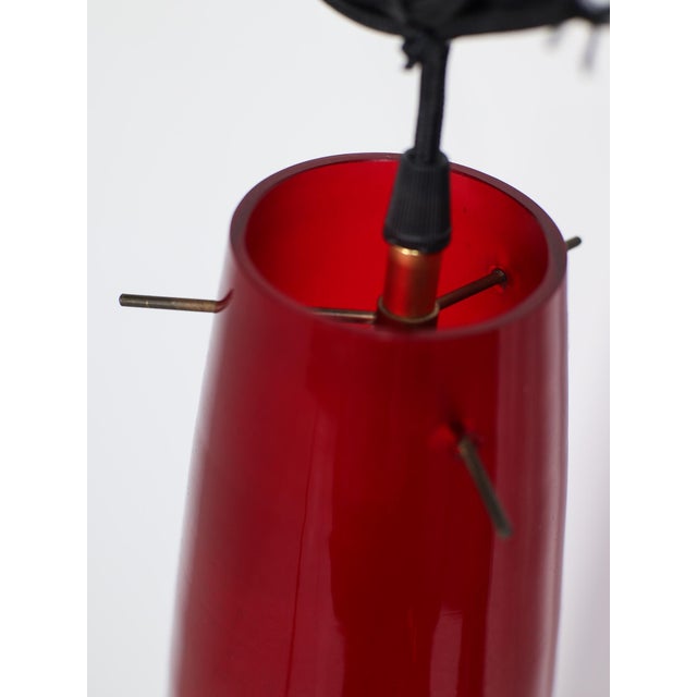 Tall cone / ellipse shaped lamp designed by Alessandro Pianon for Vistosi, 1960s Italy. This vintage pendant lamp features...