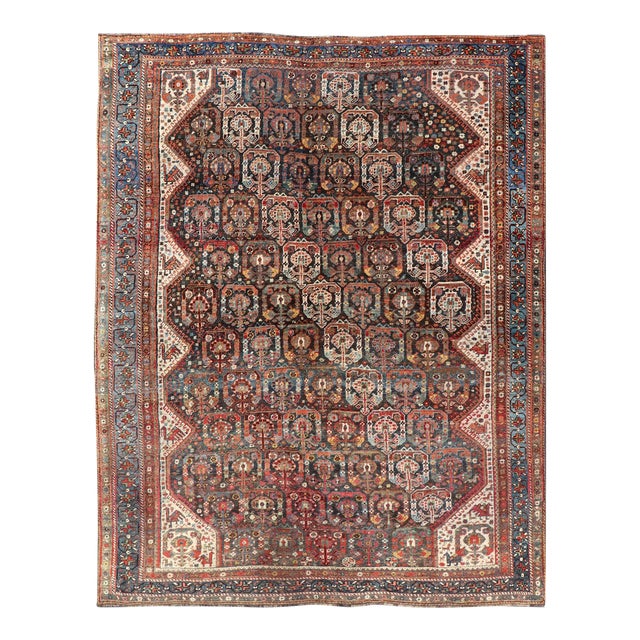 Antique Persian Qashqai Rug With Intricate Tribal Motifs and Rich Color Palette 6'10"x9'3" For Sale