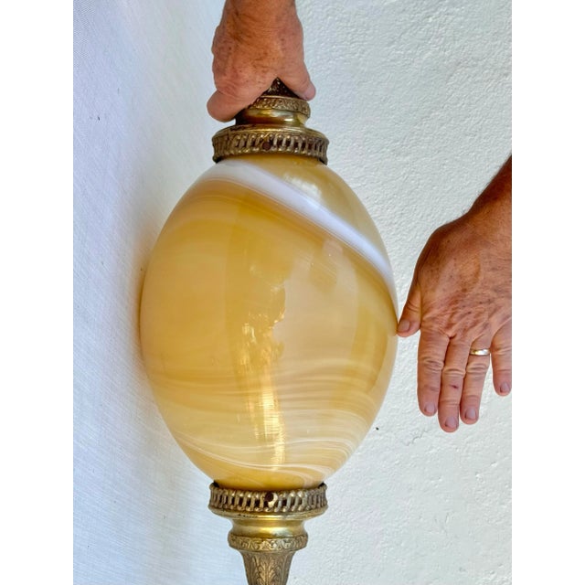 Mid-Century Modern Vintage Murano Style Very Large Oval Shaped Blown Glass Pendant With “Onyx” Glass Swirl Golden Coloration and Brass Fittings For Sale - Image 3 of 12