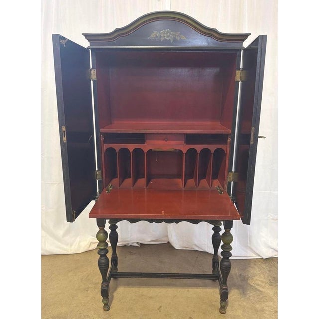 An antique Art Deco, black and green Chinoiserie drop-front desk from the 1920s is a striking fusion of Asian-inspired...