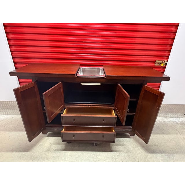 This Pottery Barn Torrens extendable sideboard is a beautiful and practical piece for anyone who enjoys entertaining or...