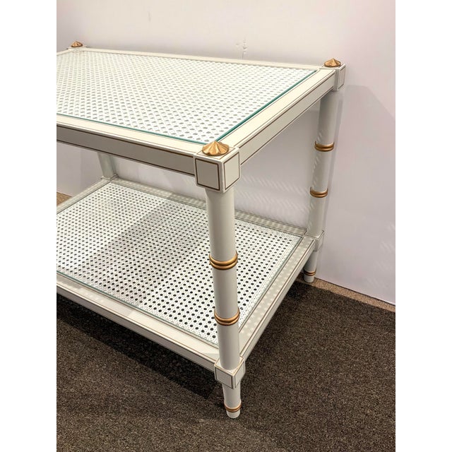 Stylish Chelsea House Conner Cane Cocktail Table. Woven cane panels, brass accents. Showroom Floor Sample.