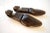 • Pair of vintage wood shoe lasts made by J.V. Shoe Tree Co, Brockton, Mass. • Center metal bracket. • Size 10B imprinted...