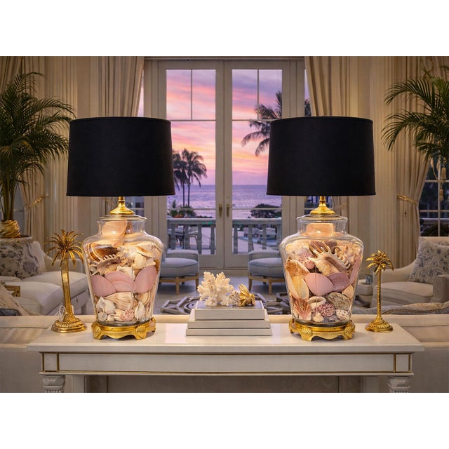 Offering a pair of vintage seashell table lamps, circa 1980s. These luxurious large and heavy vintage glass seashell lamps...