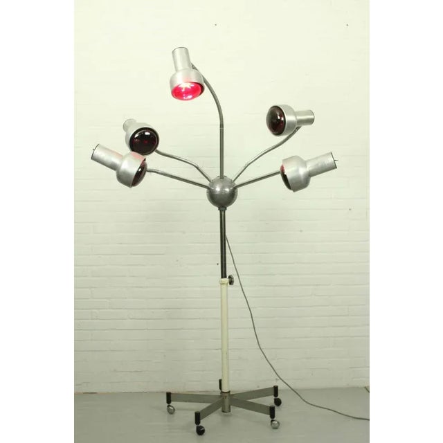 For the real space age fan. Very unusual Mid-Century chrome lamp with five flexible arms. Adjustable in height. Currently...
