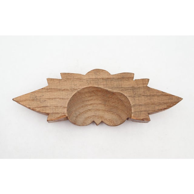 Vintage Eastlake Victorian wood drawer pull with a classic nut and leaf motif. It features two deeply carved nuts nested...