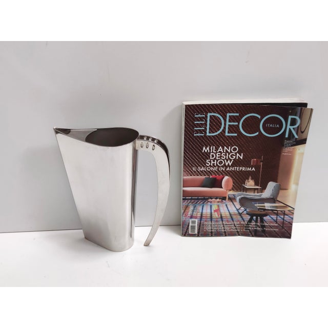 Made in Italy by Lino Sabattini, 1978 - 1981 This jug is made in silver plated brass. This is a vintage item, therefore it...