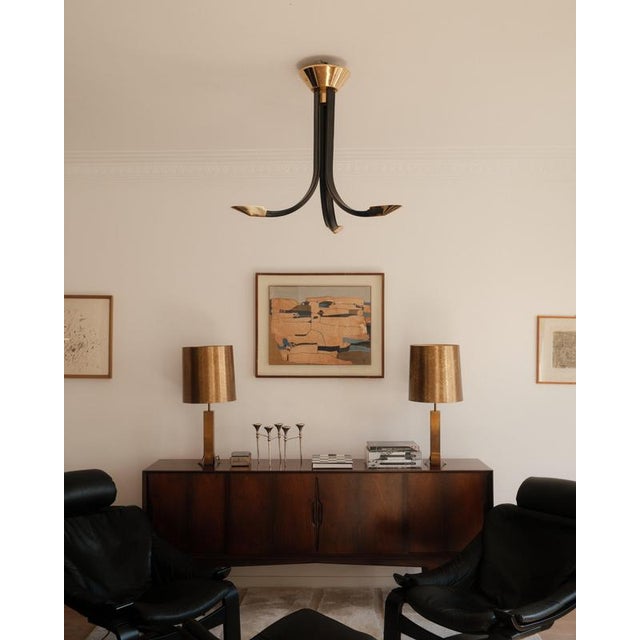 Vintage Italian Chandelier (Comelit, 1980s): This striking 3-arm chandelier features gracefully curved arms wrapped in...