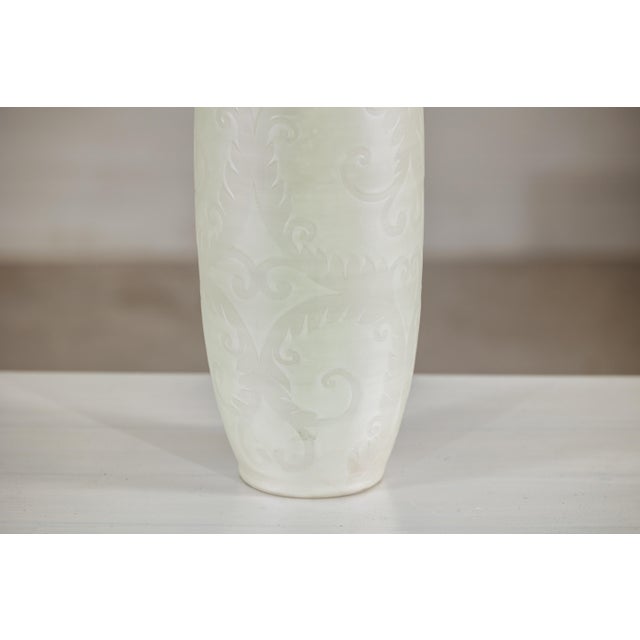 "About the Item This artisan ceramic vase is distinguished by its elegant, elongated silhouette and understated white...