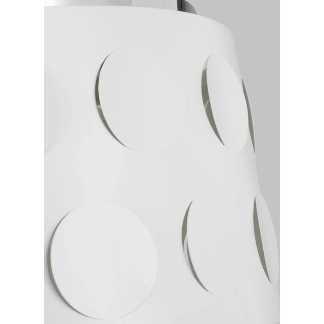 Dots are iconic to the kate spade brand—a simple and playful graphic motif. Dottie takes an iconic kate spade dot motif...