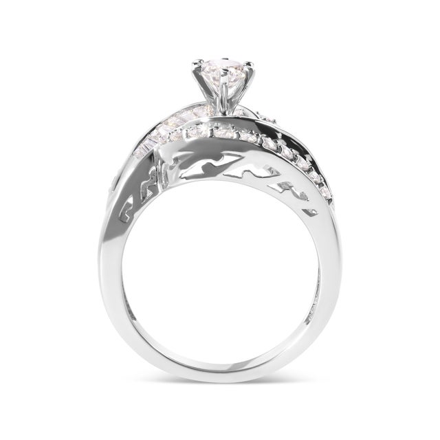 Step into a world of enchantment and grace with our mesmerizing 14K White Gold Diamond Swirl Cocktail Ring. Crafted with...