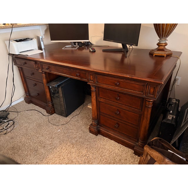 Beautiful Thomasville executive desk crafted in a rich, warm-toned wood with a timeless traditional design. This piece...
