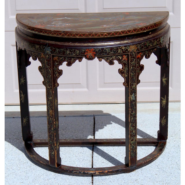 Elevate your space with this exquisite 19th-century Chinese Demi-Lune Console Table, a fine example of Qing Dynasty...