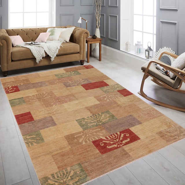 Transform your home's interior with a stunning hand-knotted Gabbeh rug. These rugs are meticulously crafted with bold...