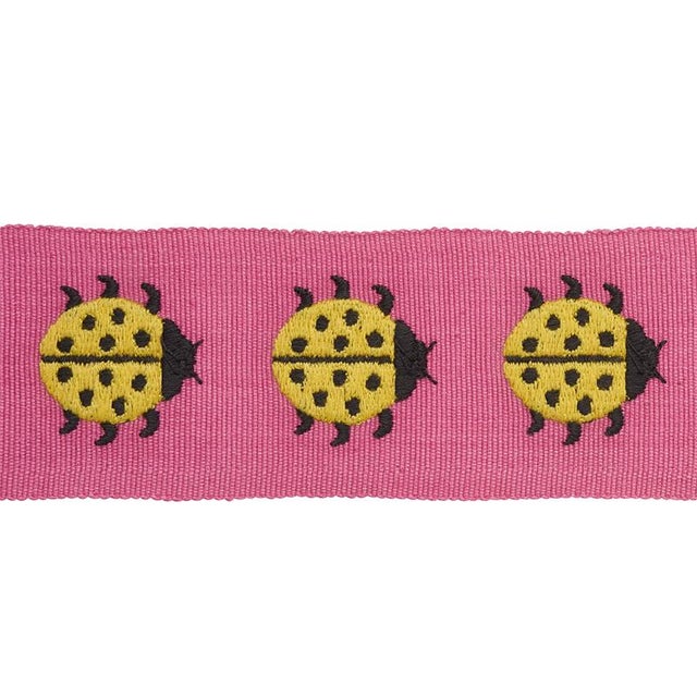Embroidered ladybugs march along a woven cotton tape for a sunny and happy accessory that’s the height of preppy chic....