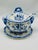 This charming blue and white piece appears to be a vintage covered soup tureen or condiment server with underplate and...