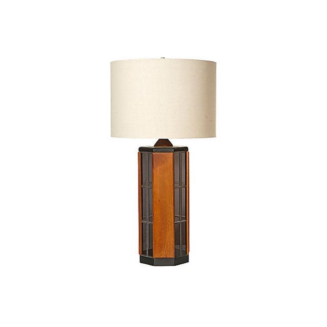 1970s eight-sided solid walnut and smoked glass table lamp. Wired for the US and in working condition; takes a 100W-max...