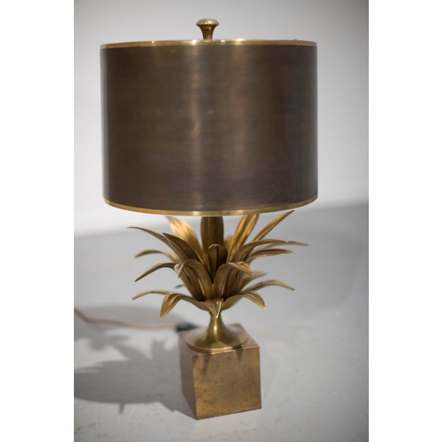 This lamp is a 1970's Maison Charles Lotus Flower bronze lamp with a green and bronze shade.