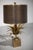 This lamp is a 1970's Maison Charles Lotus Flower bronze lamp with a green and bronze shade.