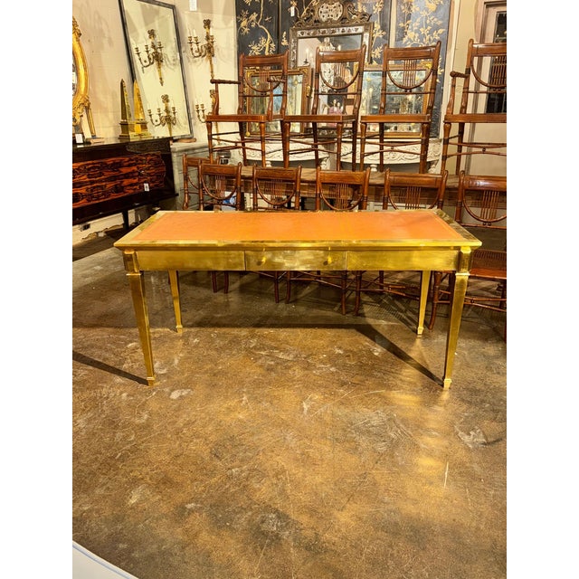 The Italian John Vessey Style Brass Desk is a luxurious and elegant desk made with high-quality brass materials. This desk...