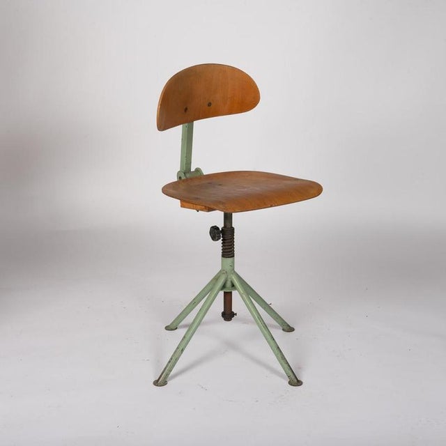 Wooden industrial chair from the 1950s.