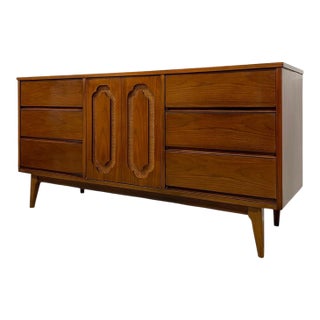 Vintage Mid Century Modern Walnut Toned Credenza With Cane Door Front and Dovetailed Drawers For Sale