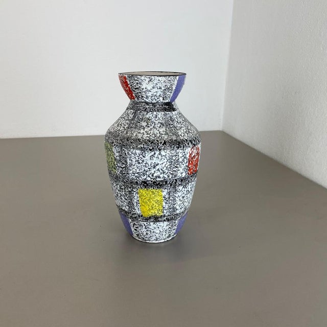 Article: pottery ceramic vase. Producer: bay ceramic, germany. Decade: 1950s. Original vintage 1950s pottery ceramic vase...