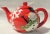 Wonderful vintage hand painted red and white porcelain figural snowman teapot. He is adorable with his green scarf and...